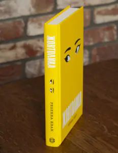 Книга Жовтолика Ребекки Кван — вигляд палітурки збоку